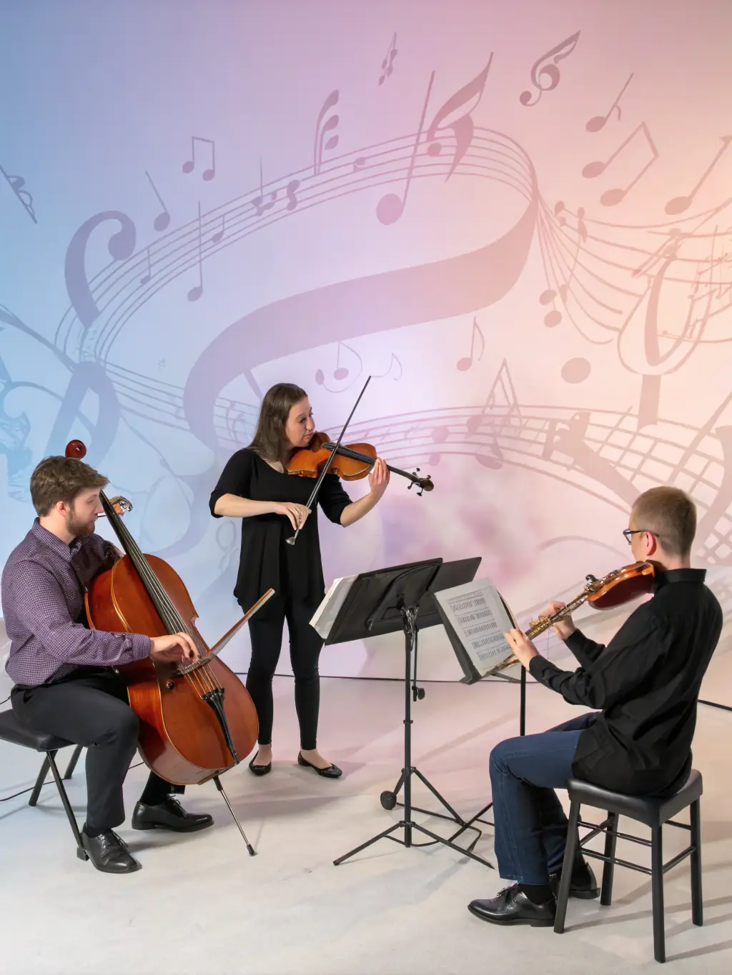 A photo of musicians collaborating and rehearsing, highlighting the importance of artistic creation and cultural transmission within the organization.